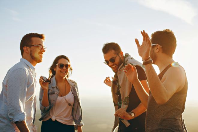 people laughing in a circle
